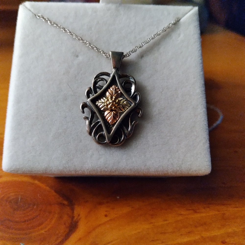 Coleman company Black hills gold necklace.